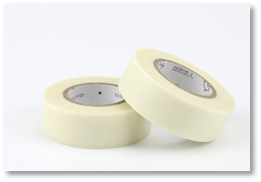 A roll of tape on a white background

Description automatically generated
